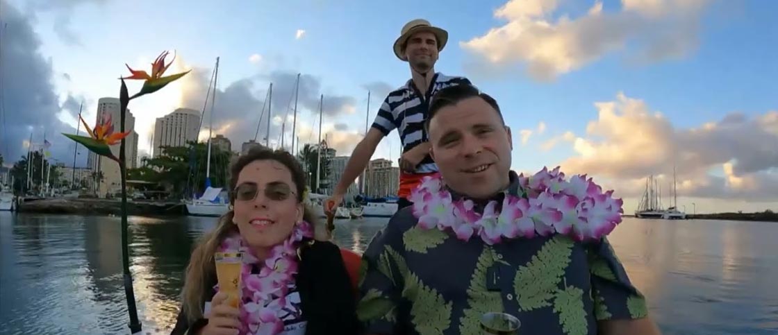 Venetian gondola on the Pacific at sunset with Waikiki fireworks