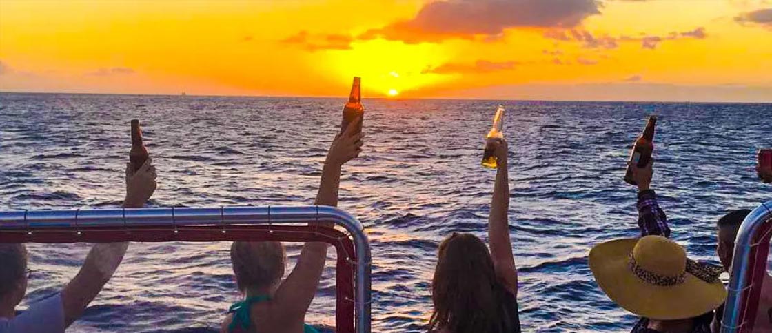 Raising Glass to Hawaii Sunset